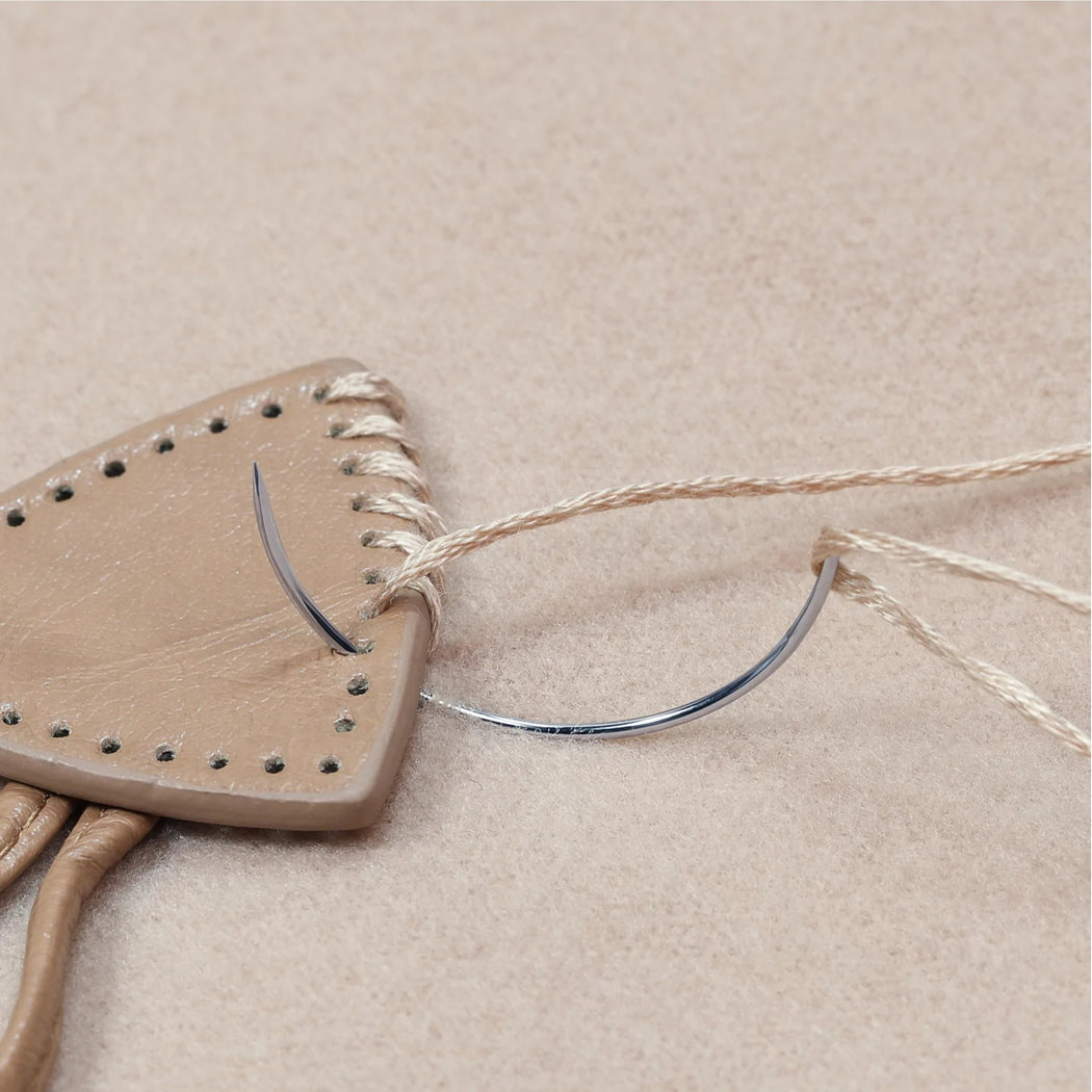 Information related to zippers, thread, and sewing.